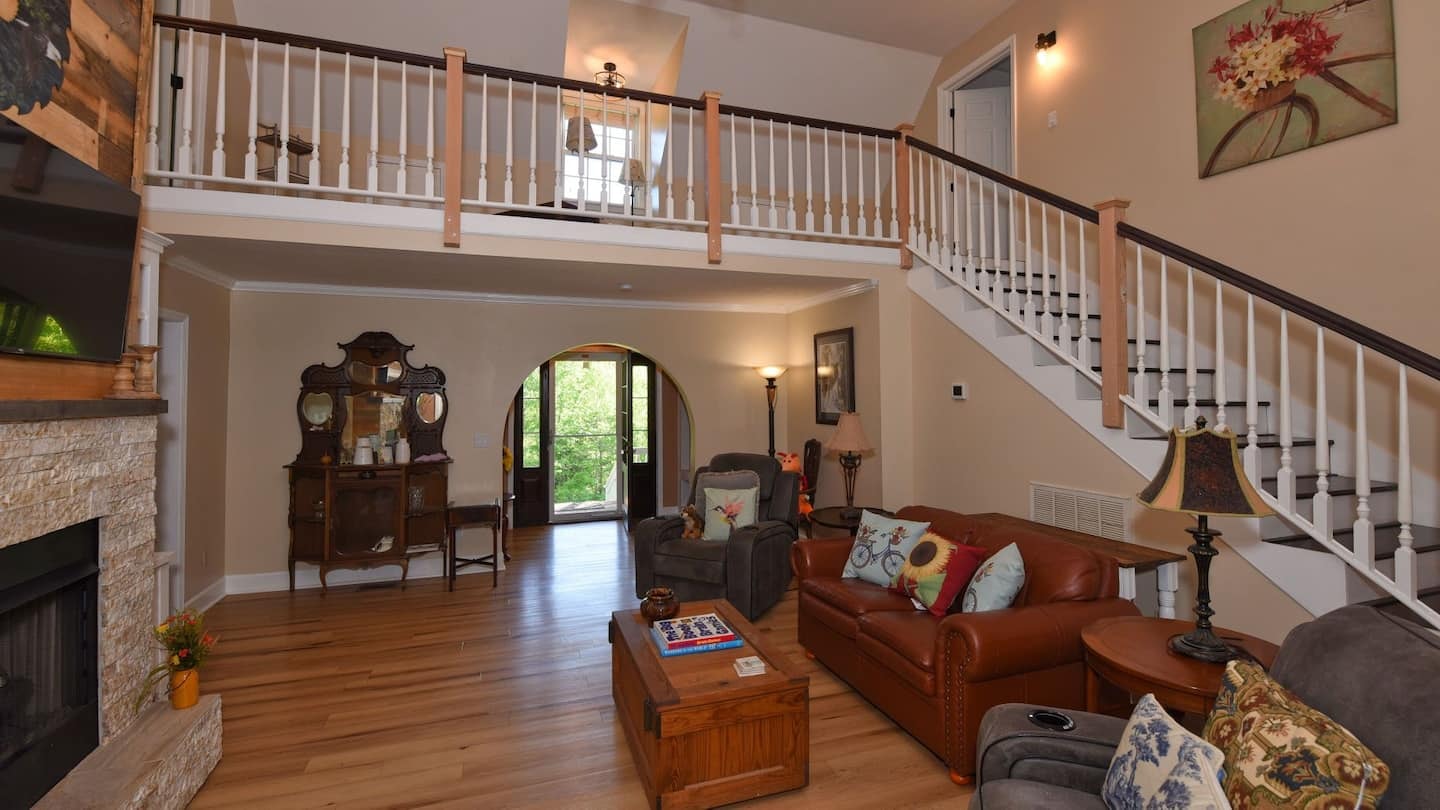 Hawk's Crest Landing I — living room with grand staircase and open two-story layout