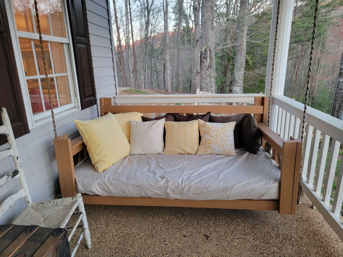 Hawk's Crest Landing I — twin-mattress porch swing daybed with pillows