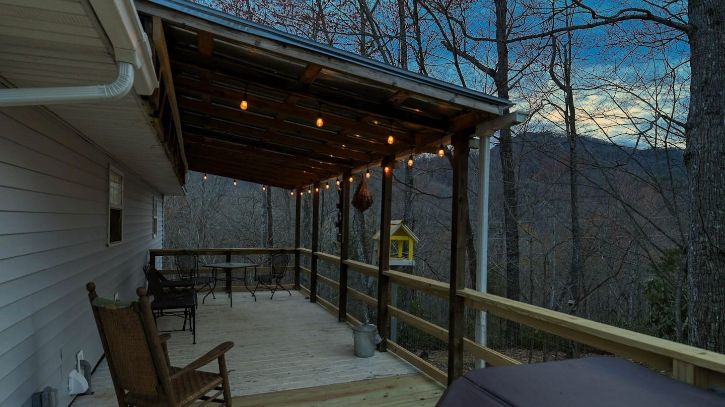 Hawk's Crest Landing II — back deck with string lights at dusk