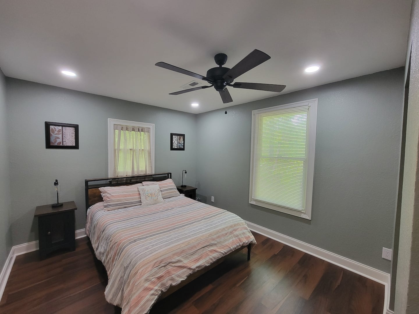 Hawk's Crest Landing II — queen bedroom with striped bedding